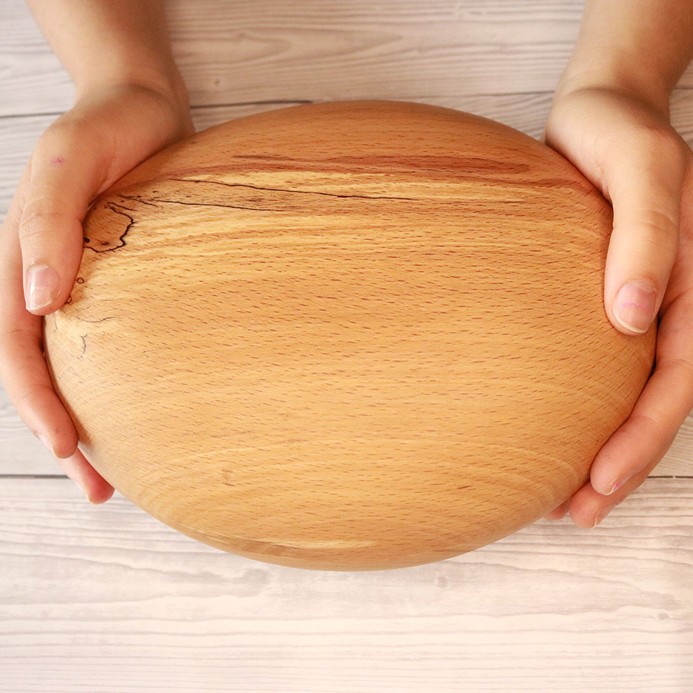Pebble Urn In Hands
